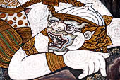 Bangkok Grand Palace, Ramakien murals of the gallery of the Wat Phra Kaew,  Hanuman enlarges himself and uses his tail as a bridge for the monkey army to cross a river (detail). 